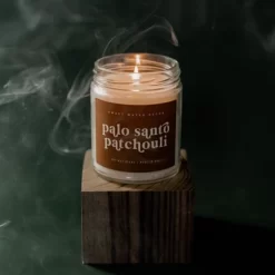 Sweet Water Decor Palo Santo Patchouli Rust Label 9oz Clear Jar Soy Candle -Home Decor Outlet Store GUEST 649bf94e 6bb4 4a95 8803 371fc8bbd491